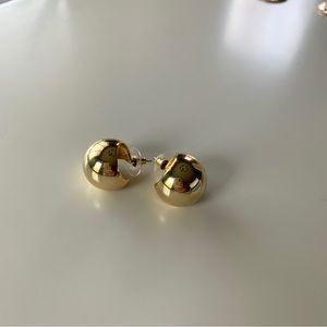 EUC - gold coloured hollow sphere statement studs